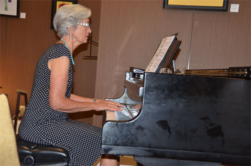 Photo of Dianne's sister playing piano