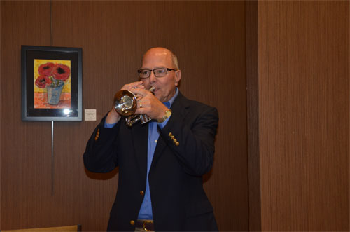 Photo of John on trumpet